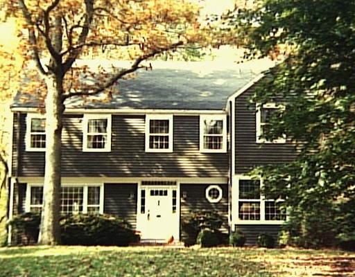 100 Ruscoe Road Wilton, CT 06897 - Photo 1 of 1 front view of house with a street
