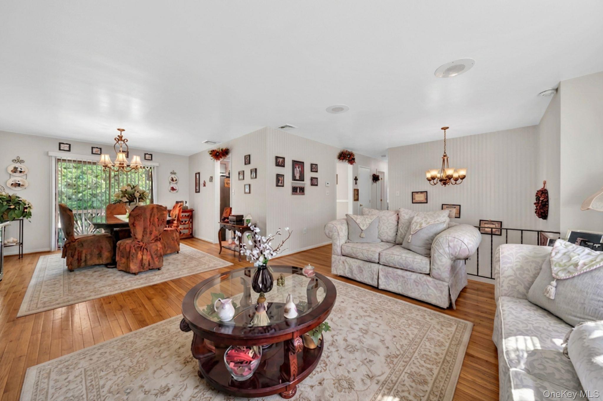 16 Woodward Road Slate Hill, NY 10973 - Photo 12 of 37 a living room with furniture and a dining table