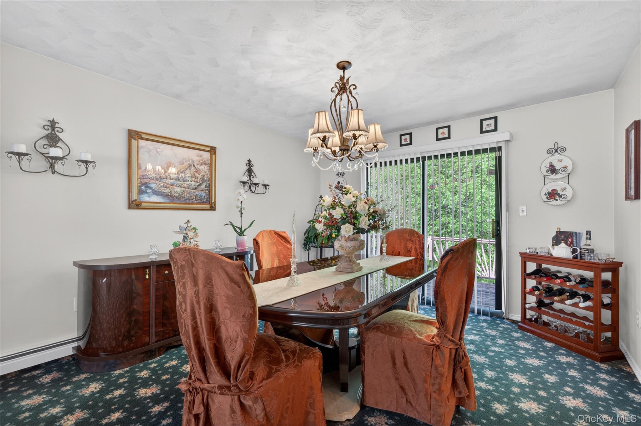 16 Woodward Road Slate Hill, NY 10973 - Photo 15 of 37 a view of a dining room with furniture and chandelier