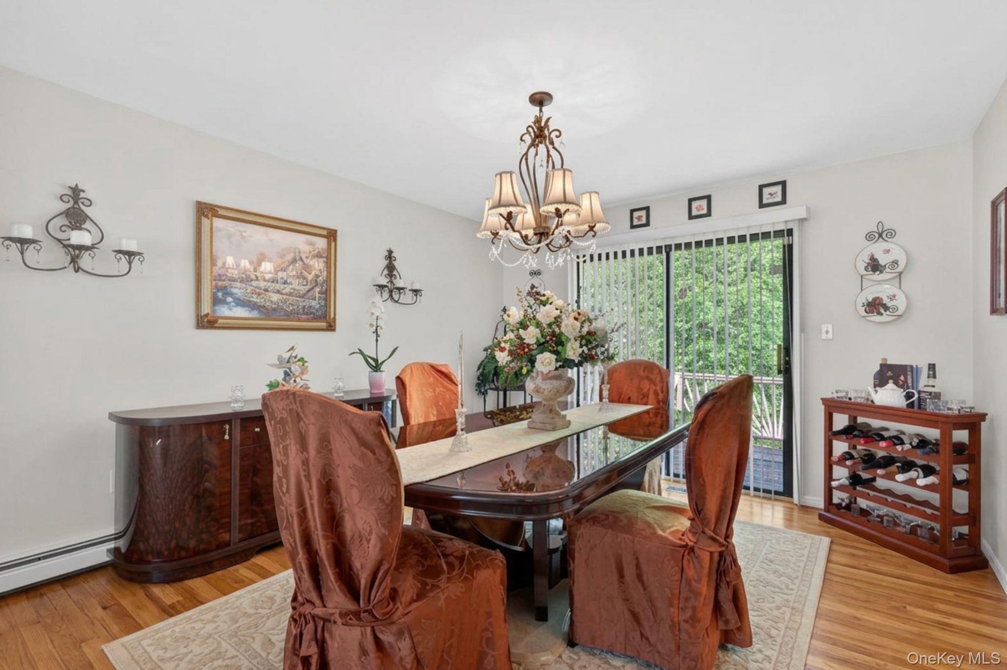 16 Woodward Road Slate Hill, NY 10973 - Photo 16 of 37 a view of a dining room with furniture and wooden floor