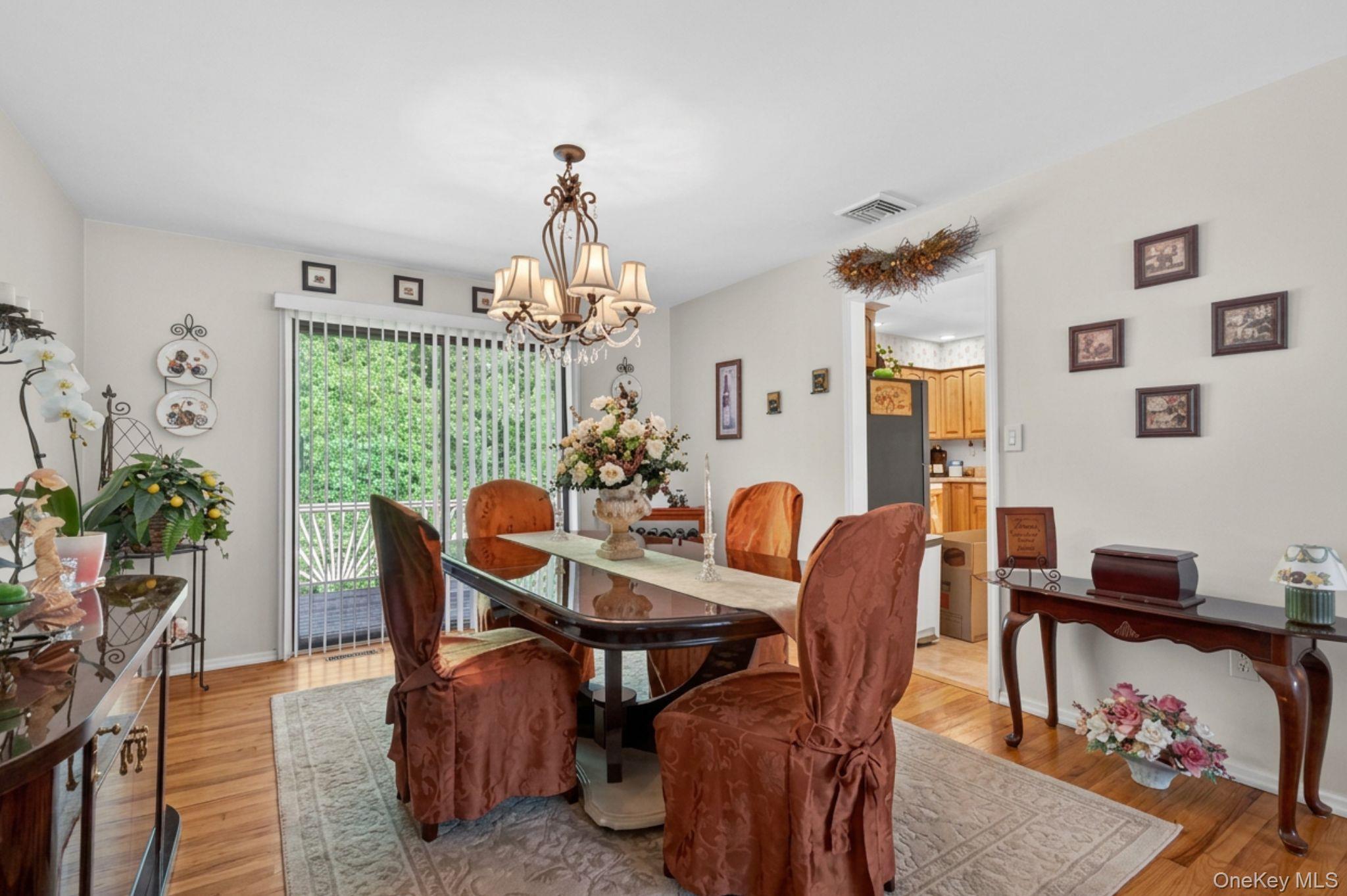 16 Woodward Road Slate Hill, NY 10973 - Photo 18 of 37 a view of a dining room with furniture window and wooden floor