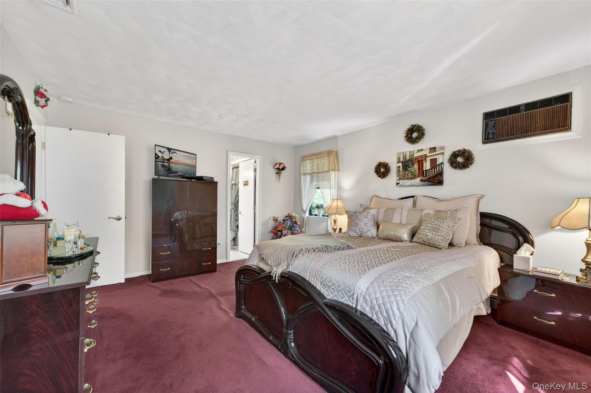 16 Woodward Road Slate Hill, NY 10973 - Photo 25 of 37 a bedroom with a bed and a tv