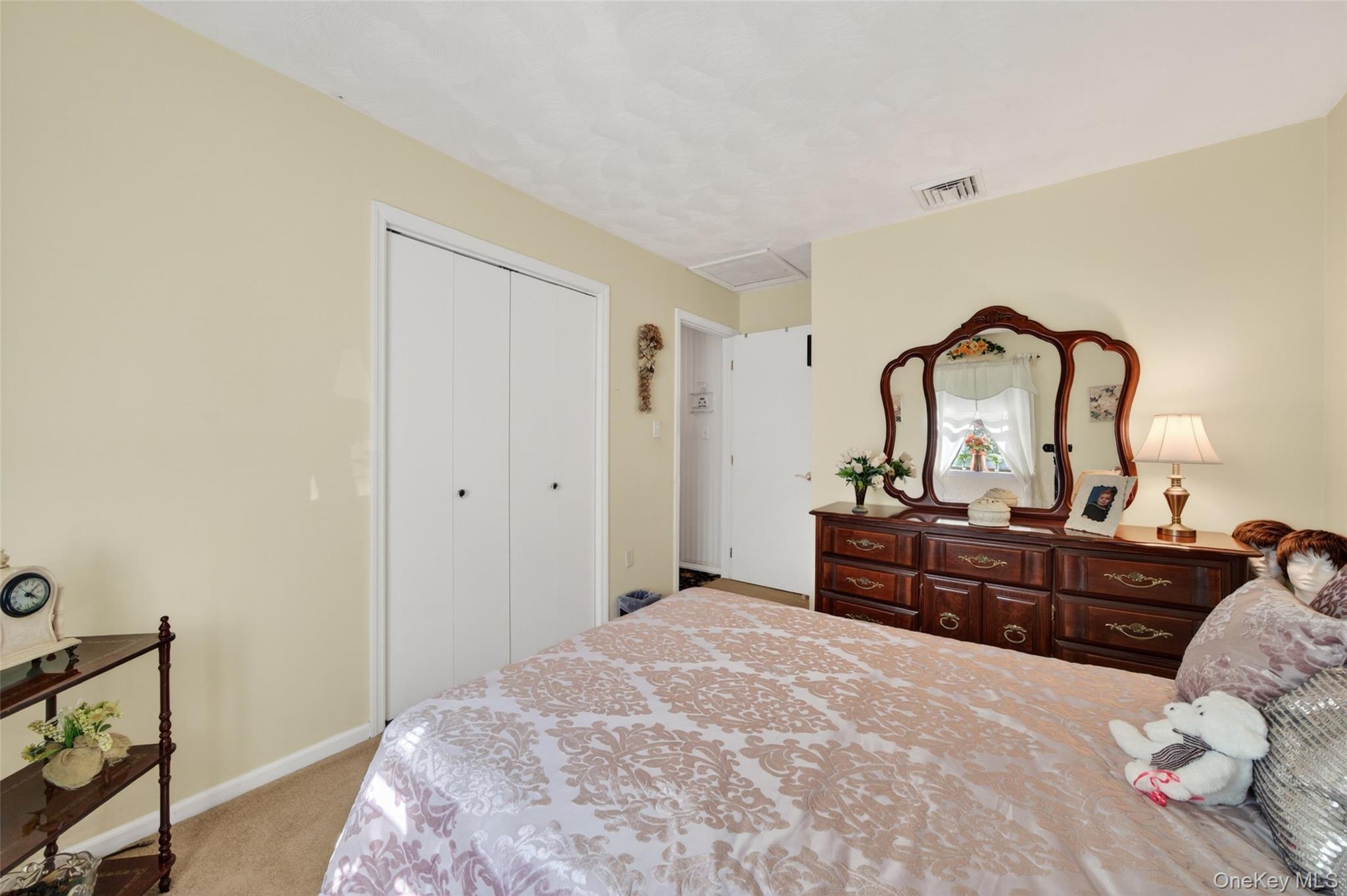 16 Woodward Road Slate Hill, NY 10973 - Photo 28 of 37 a bed room with a bed and a dresser