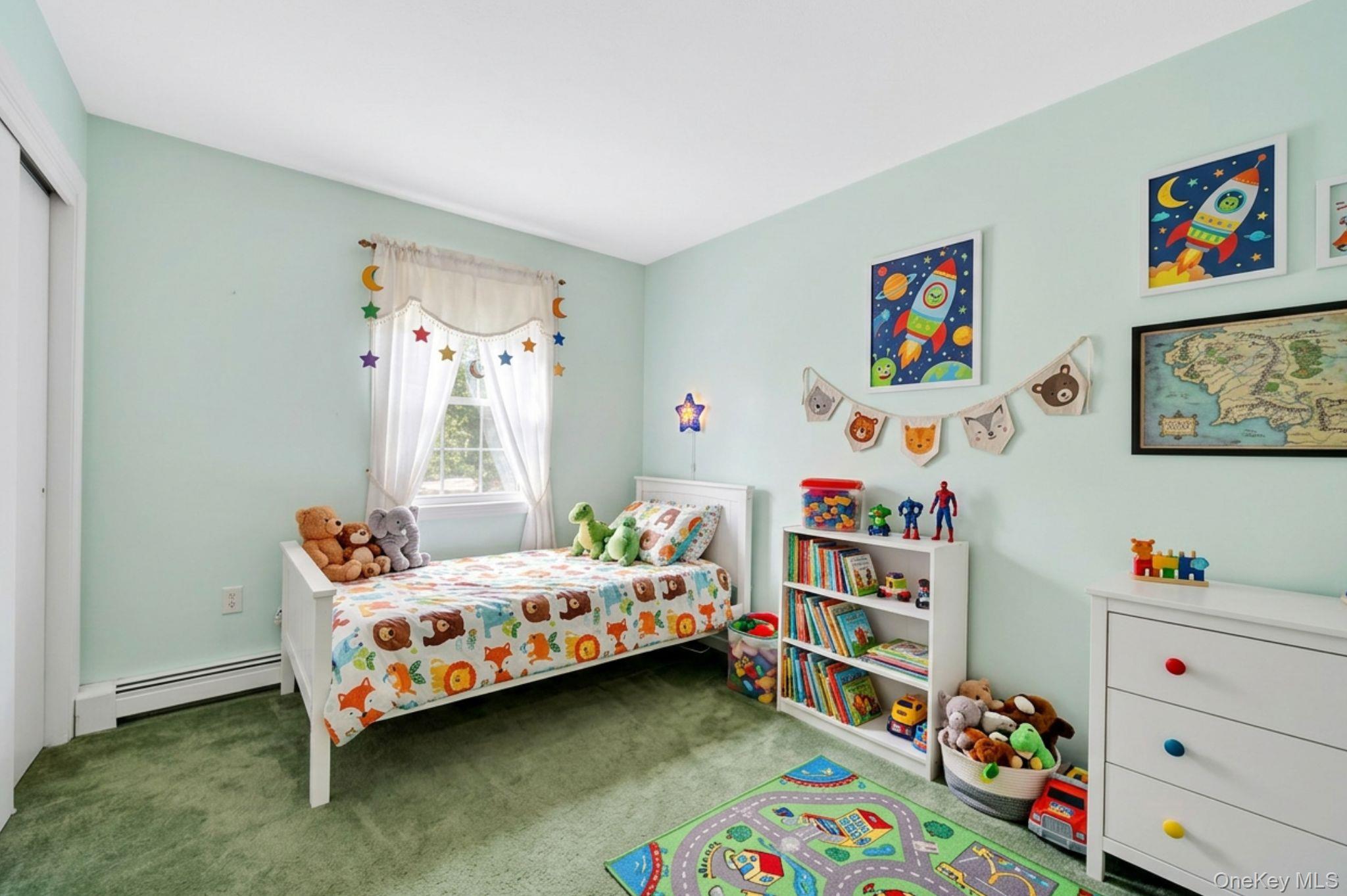 16 Woodward Road Slate Hill, NY 10973 - Photo 30 of 37 a bedroom with toys and a wooden floor