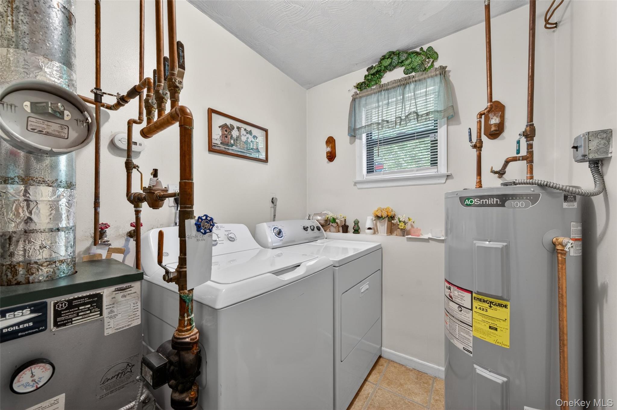16 Woodward Road Slate Hill, NY 10973 - Photo 36 of 37 a utility room with multiple dryer and washer