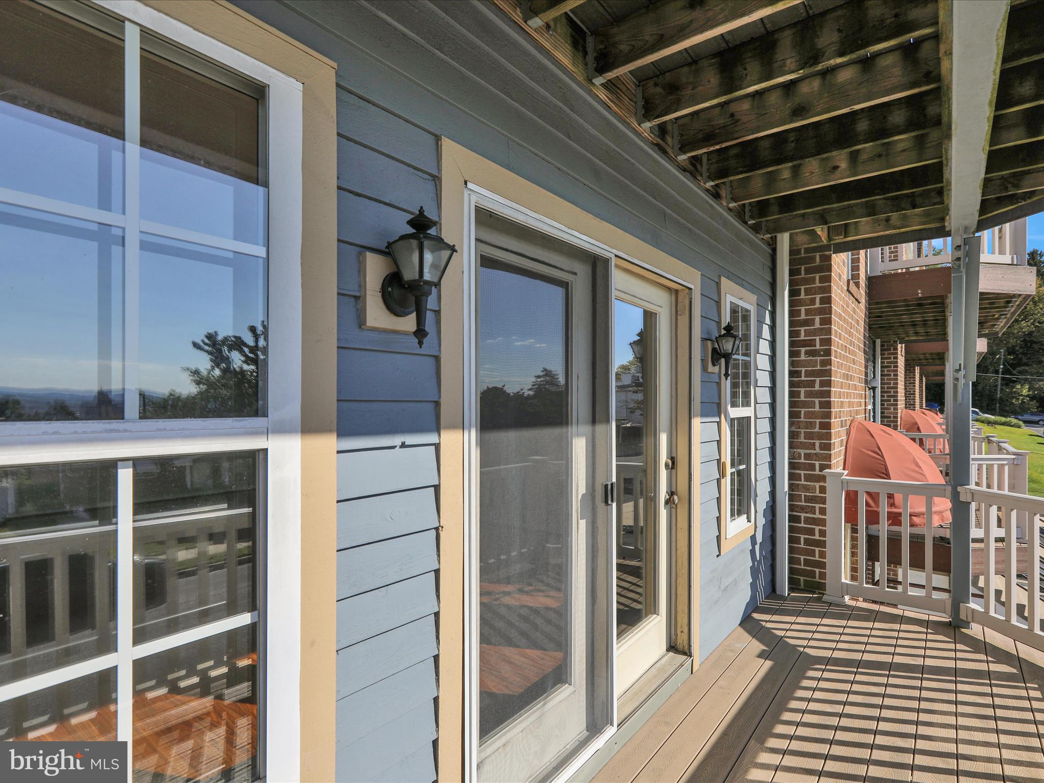 225 North 14th Street Reading, PA 19604 - Photo 20 of 23 a view of a balcony with wooden floor and windows