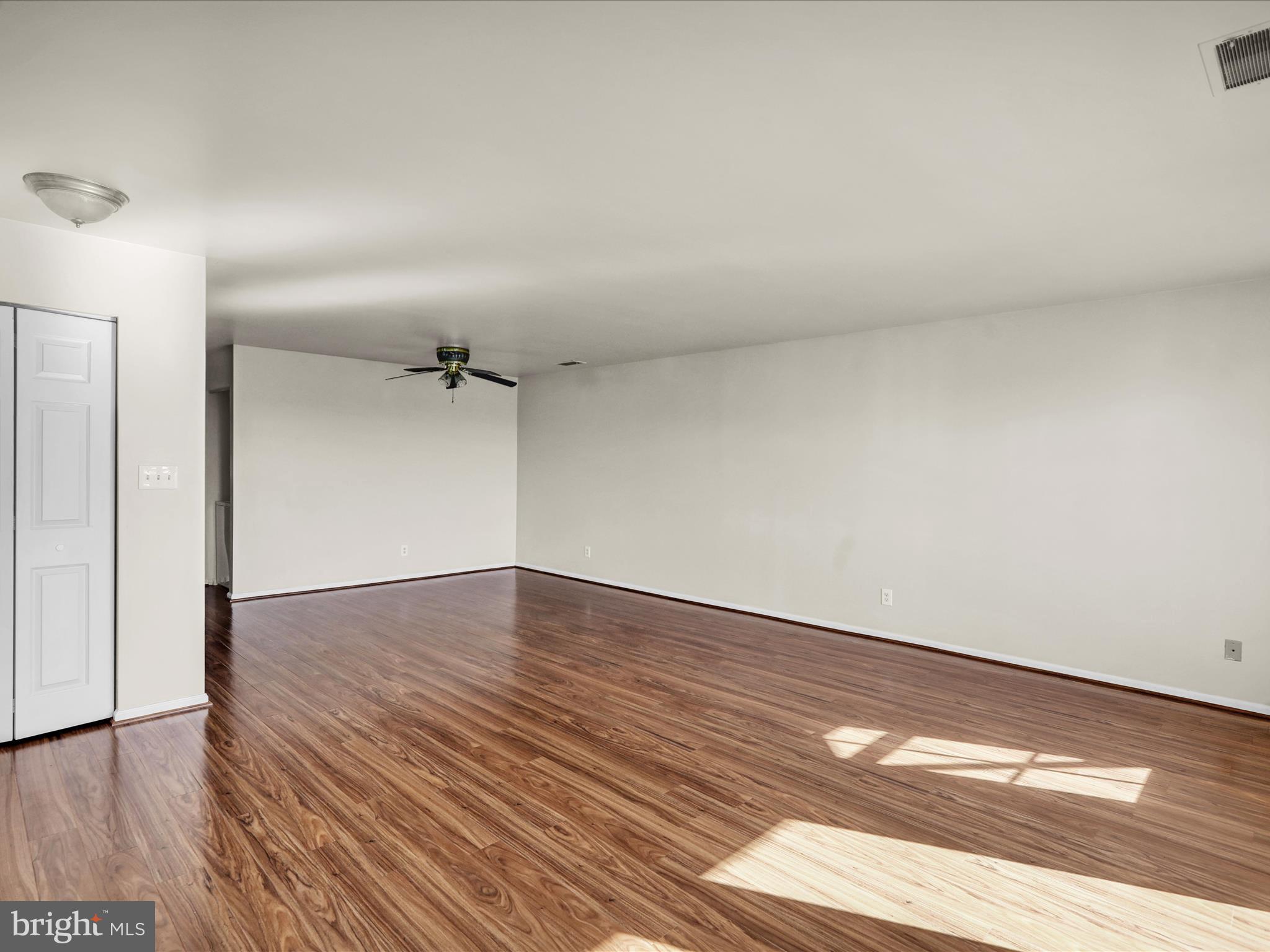 225 North 14th Street Reading, PA 19604 - Photo 4 of 23 wooden floor in an empty room