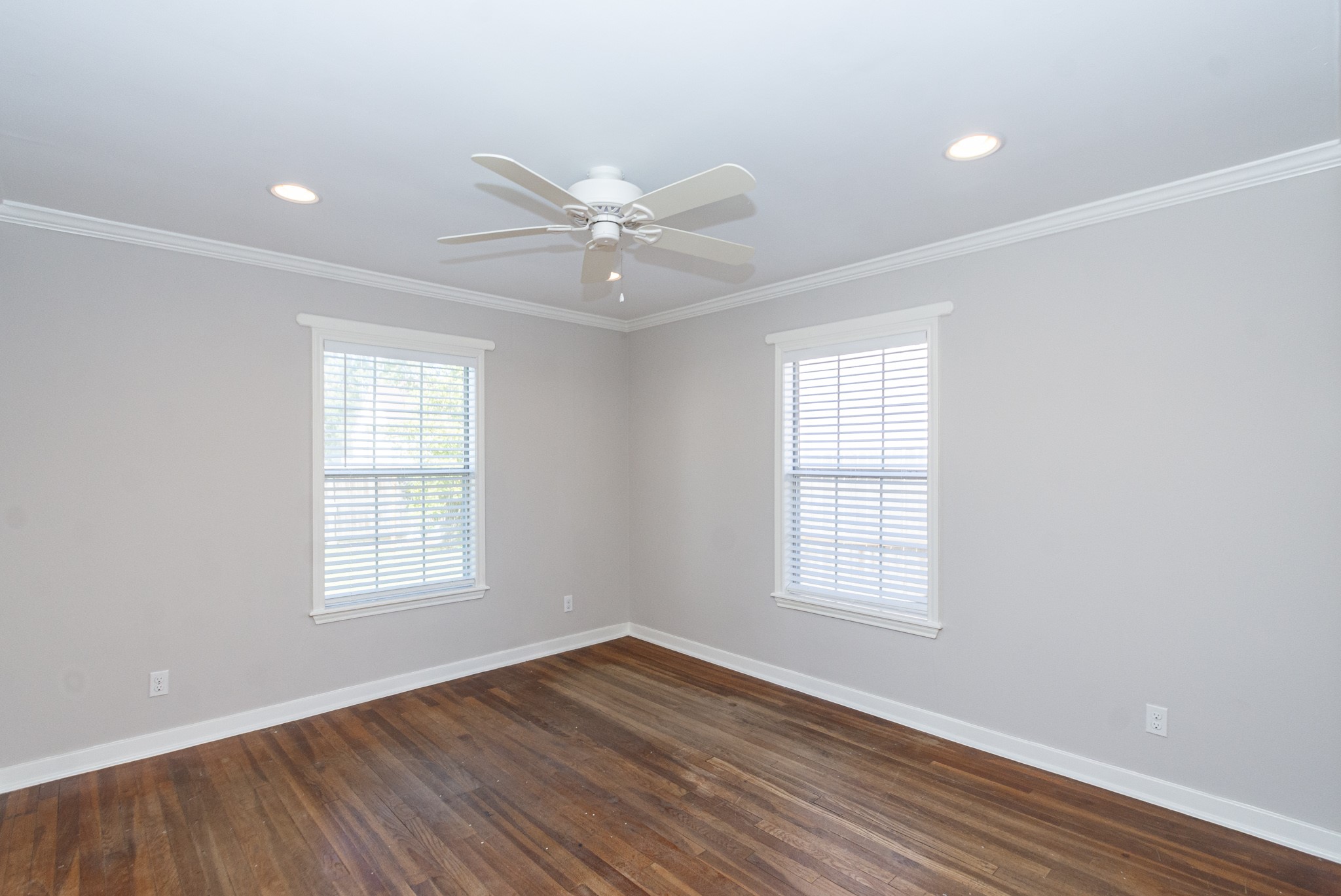 7447 Magnolia Street Houston, TX 77023 - Photo 20 of 38 wooden floor in an empty room with a window