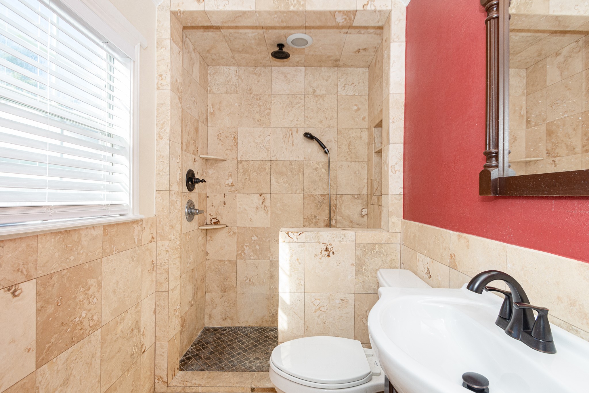 7447 Magnolia Street Houston, TX 77023 - Photo 25 of 38 a bathroom with a sink toilet and shower