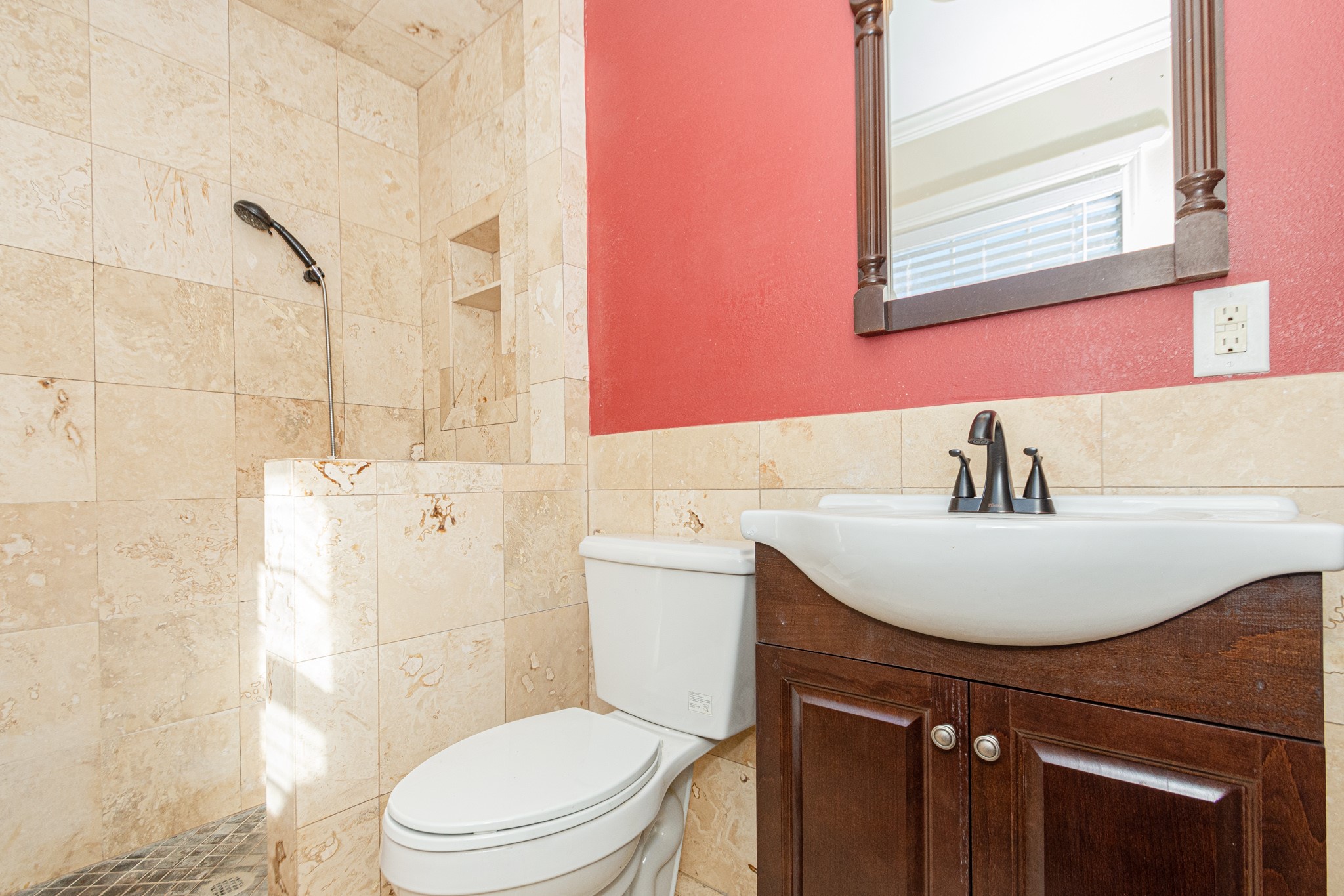 7447 Magnolia Street Houston, TX 77023 - Photo 26 of 38 a bathroom with a sink a toilet and shower
