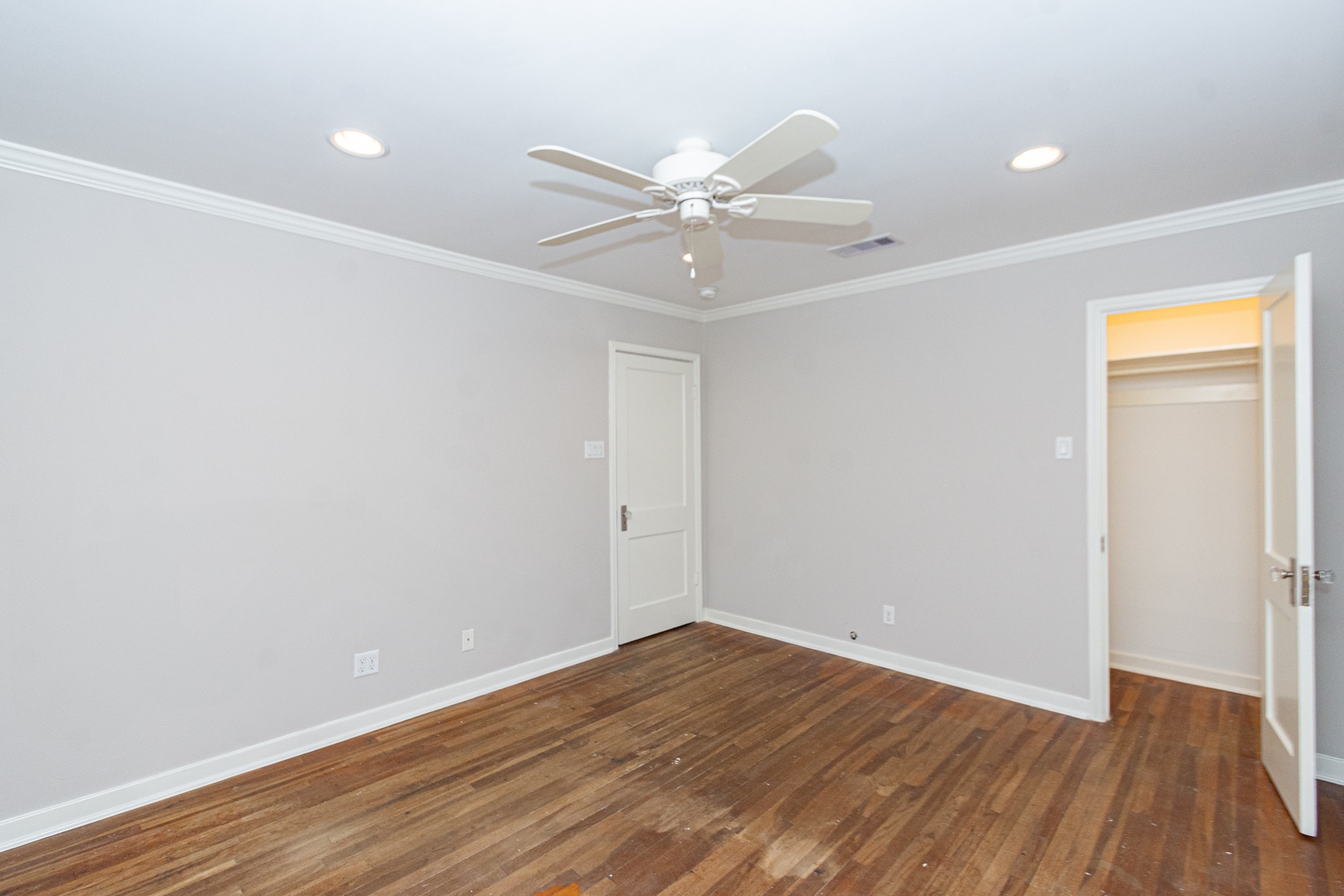 7447 Magnolia Street Houston, TX 77023 - Photo 29 of 38 wooden floor in an empty room with a window