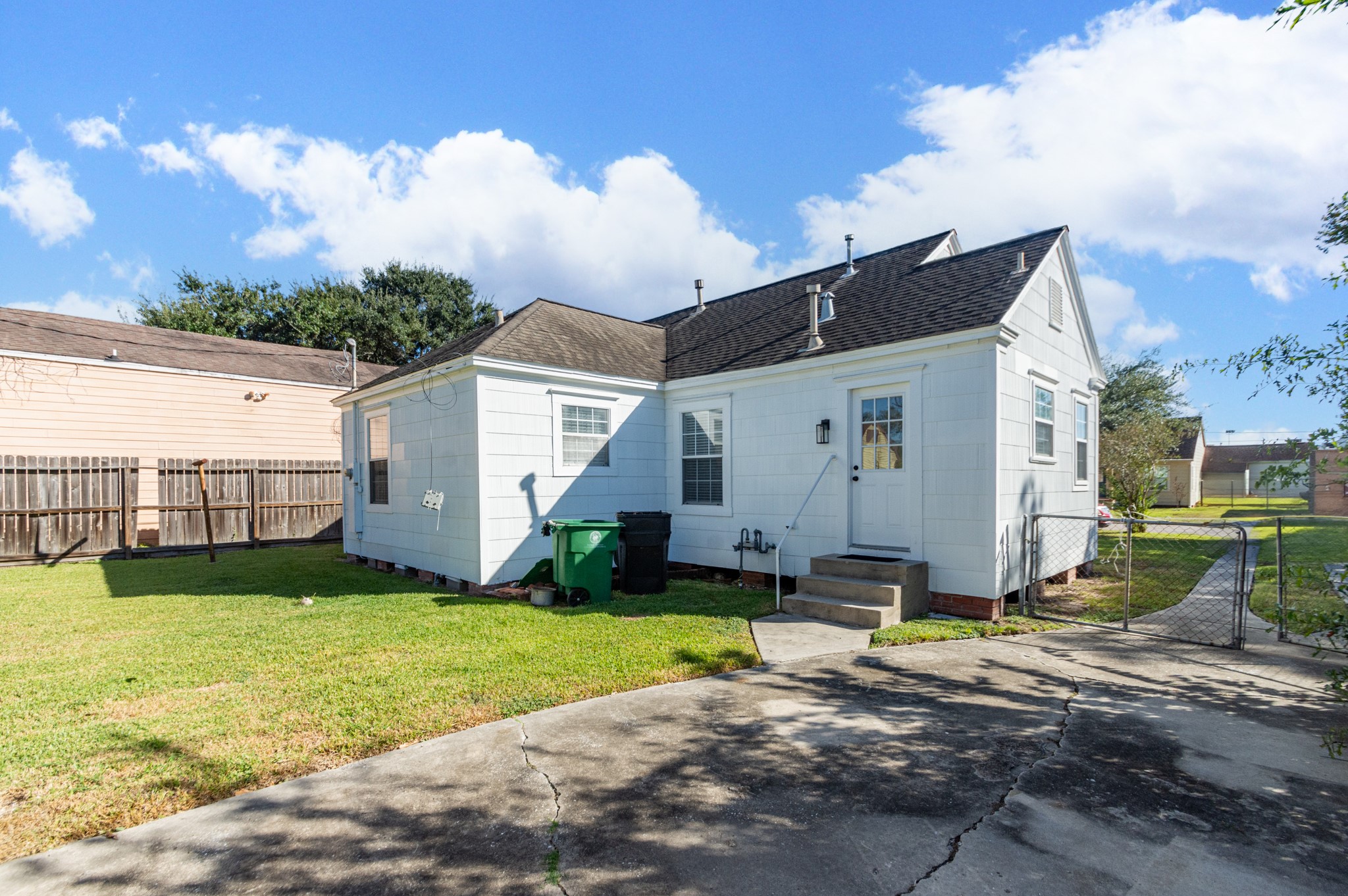 7447 Magnolia Street Houston, TX 77023 - Photo 36 of 38 a view of a backyard with a garden