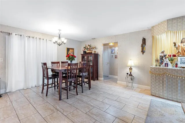 a view of a dining room with furniture