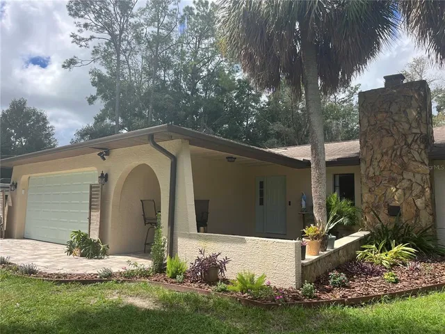 a front view of house with yard