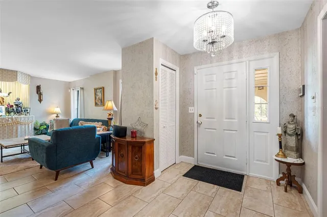 a view of a livingroom with furniture and windows
