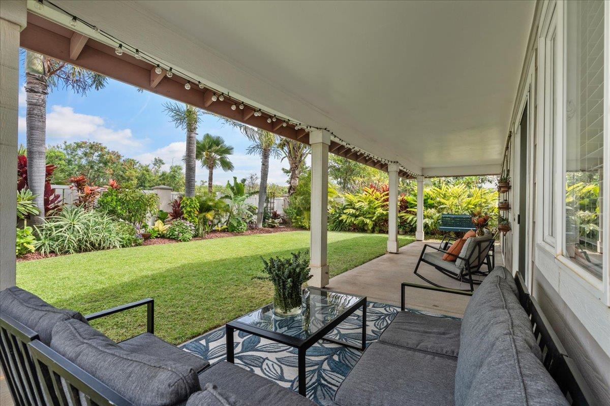 28 Papahi Loop Kahului, HI 96732 - Photo 22 of 50 a view of chairs and table in patio with wooden fence