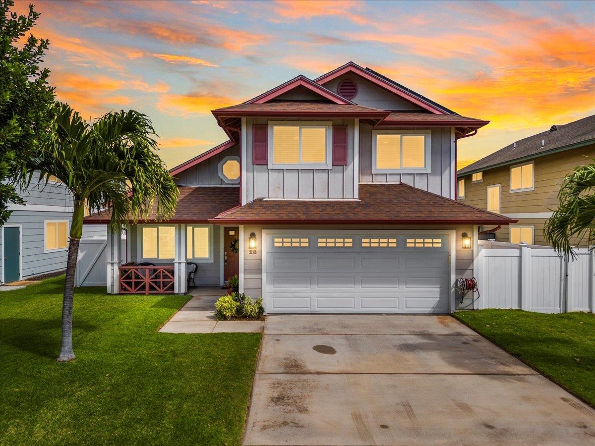28 Papahi Loop Kahului, HI 96732 - Photo 23 of 50 a front view of a house with a yard and garage
