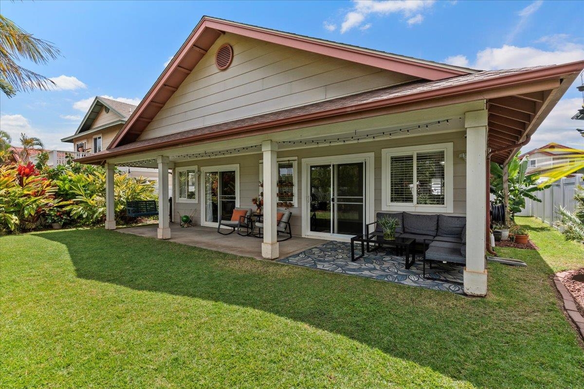 28 Papahi Loop Kahului, HI 96732 - Photo 27 of 50 a front view of house with a garden and patio