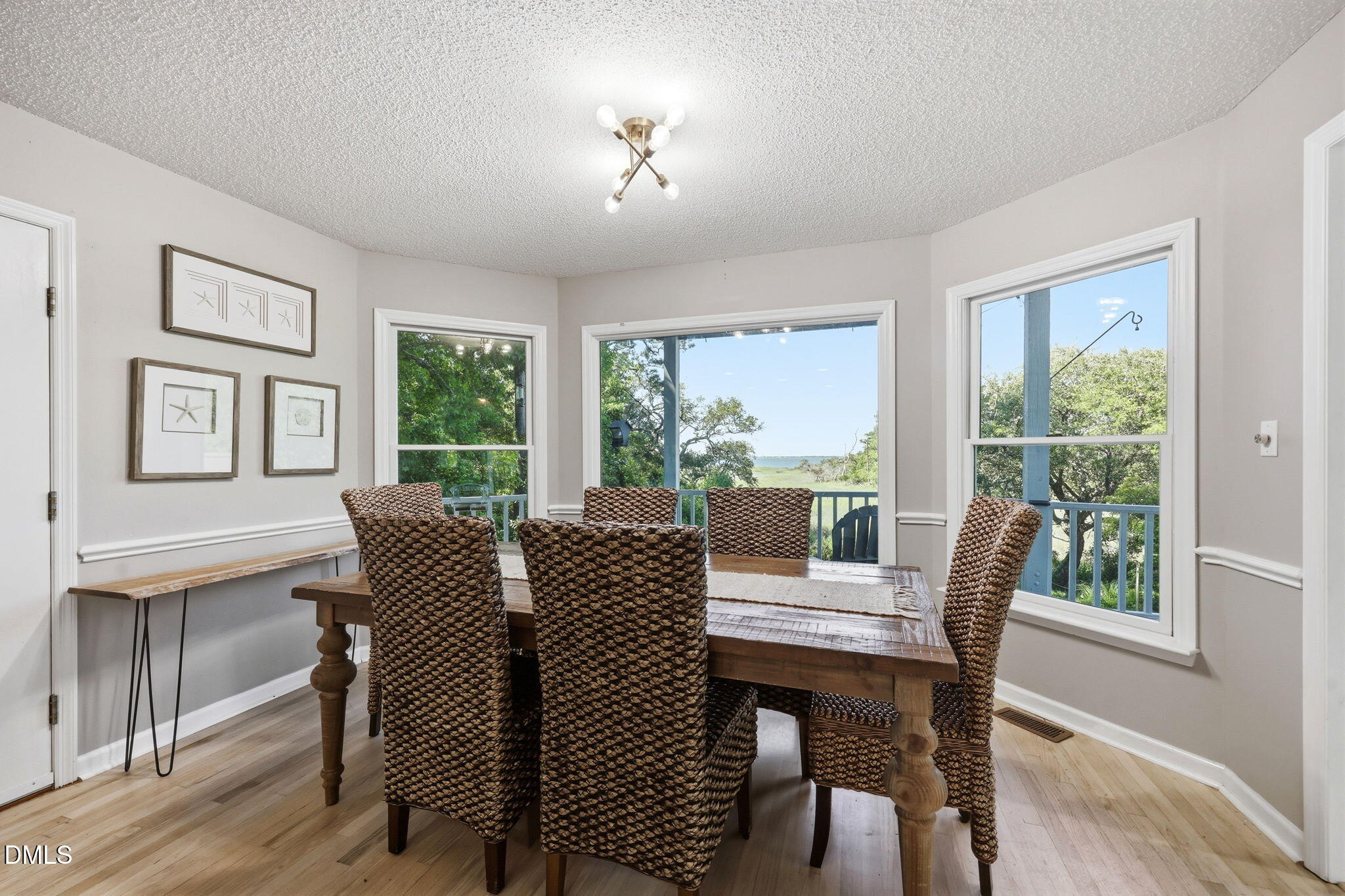 174 Windy Point Road Beaufort, NC 28516 - Photo 35 of 55 Large bay window overlooking the covered area of the deck and the ICW beyond.