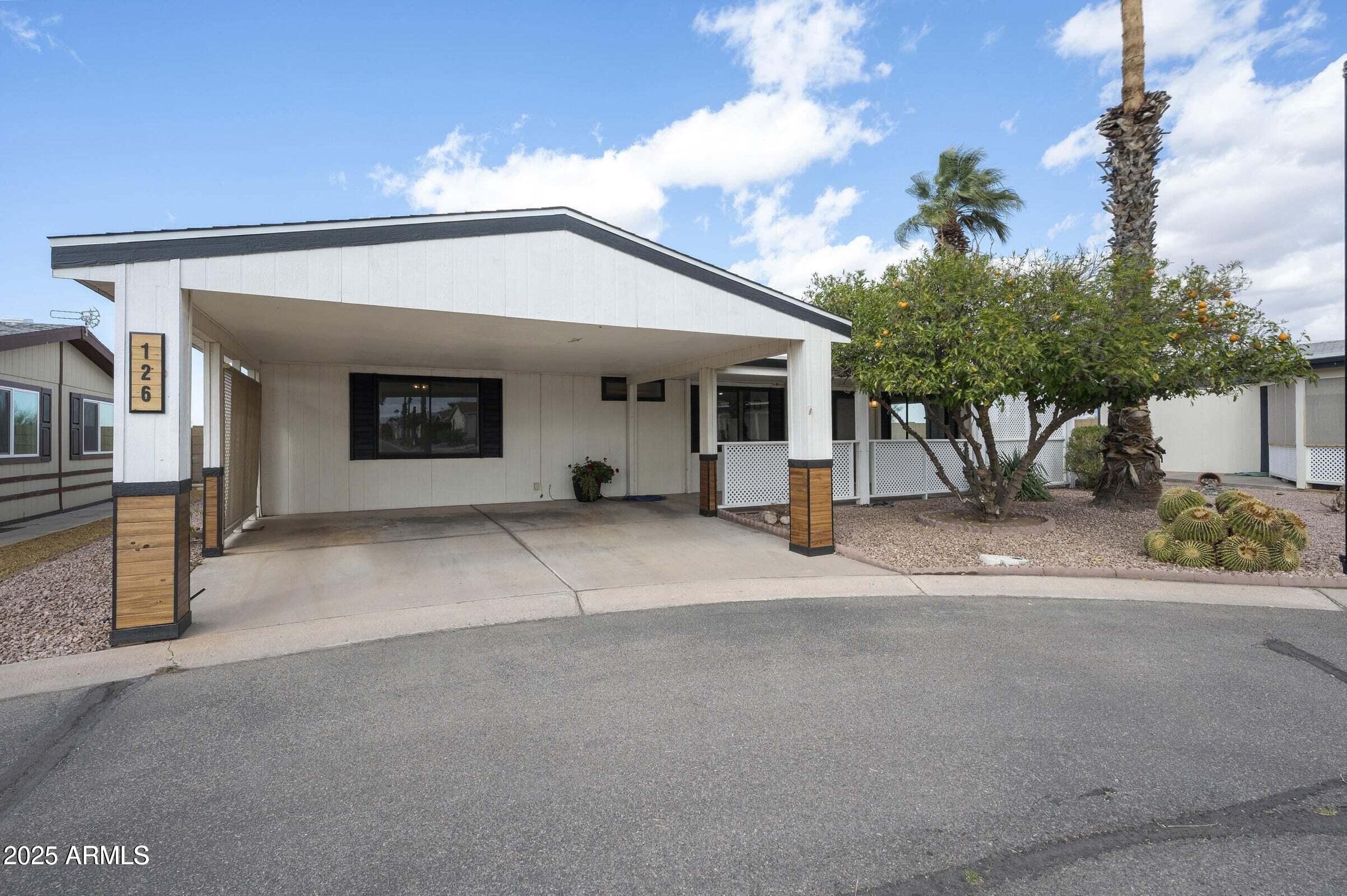 3500 South Tomahawk Road, Unit 126 Apache Junction, AZ 85119 - Photo 1 of 38 a view of a car garage of the house