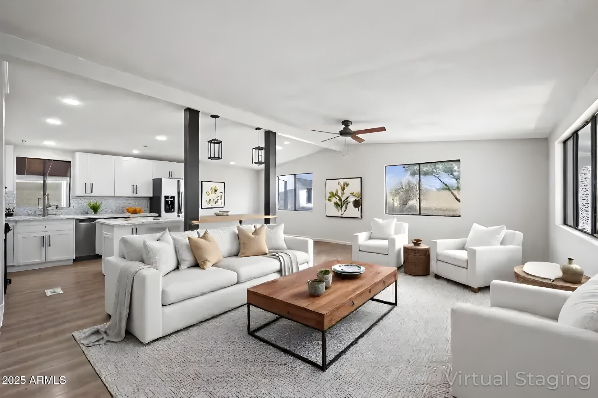 3500 South Tomahawk Road, Unit 126 Apache Junction, AZ 85119 - Photo 2 of 38 a living room with furniture kitchen view and a window