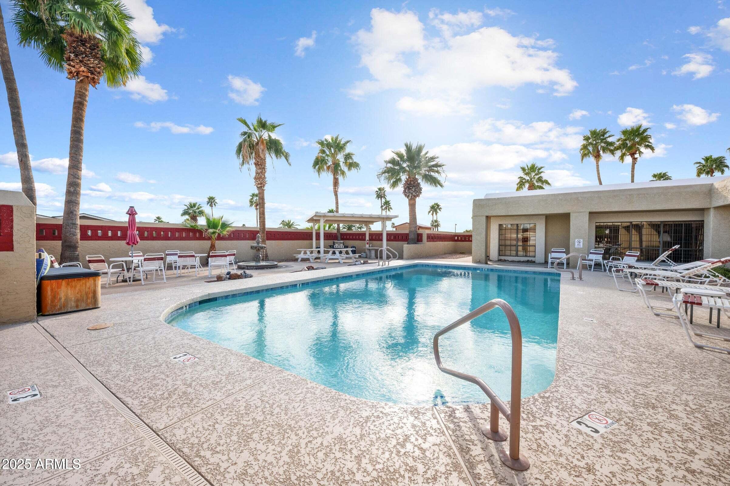 3500 South Tomahawk Road, Unit 126 Apache Junction, AZ 85119 - Photo 32 of 38 swimming pool with outdoor seating