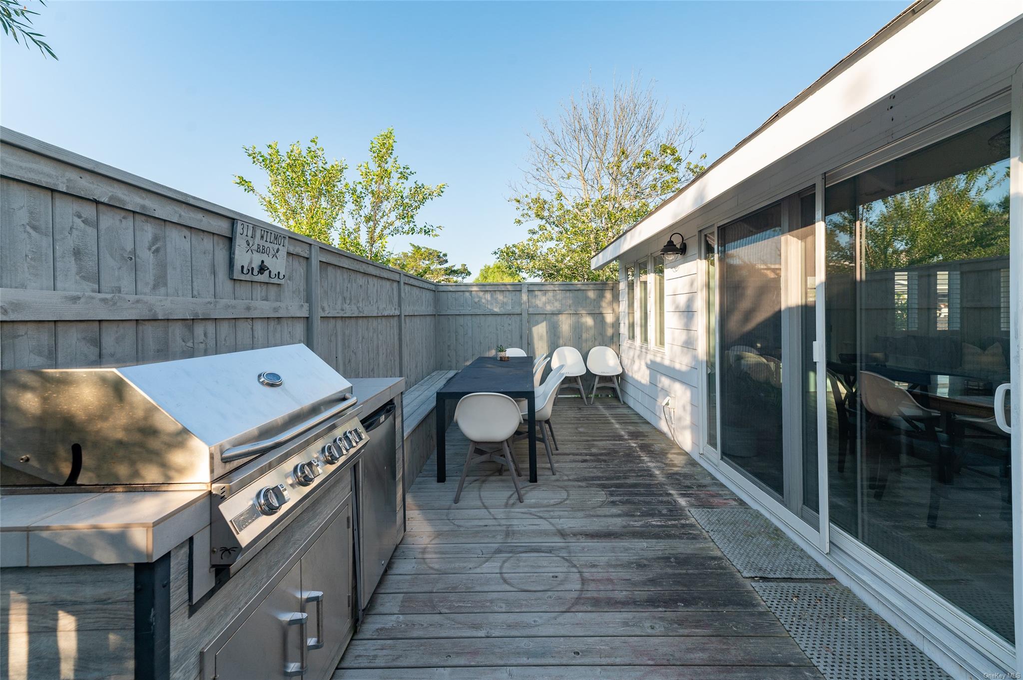 311 Wilmot Road Ocean Beach, NY 11770 - Photo 3 of 12 View of patio / terrace featuring area for grilling, a deck, and grilling area