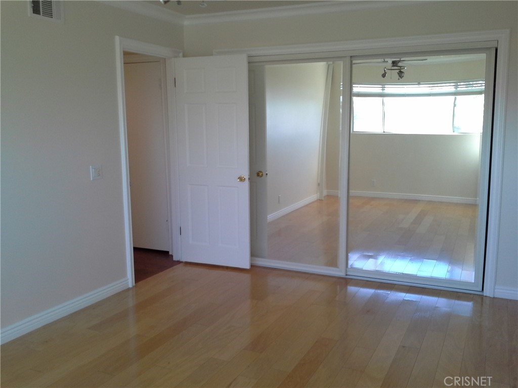 18918 Kinbrace Street Porter Ranch, CA 91326 - Photo 11 of 16 a view of empty room with window