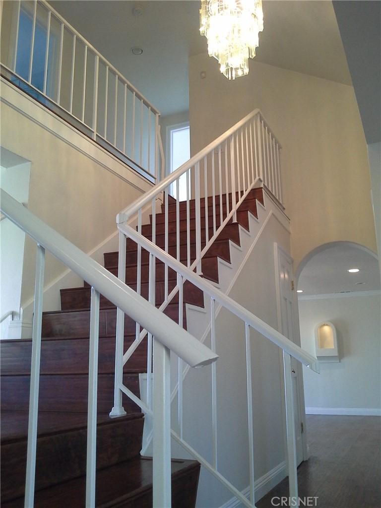 18918 Kinbrace Street Porter Ranch, CA 91326 - Photo 5 of 16 a view of entryway and hall with wooden floor