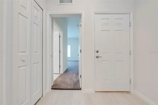 an empty room with windows