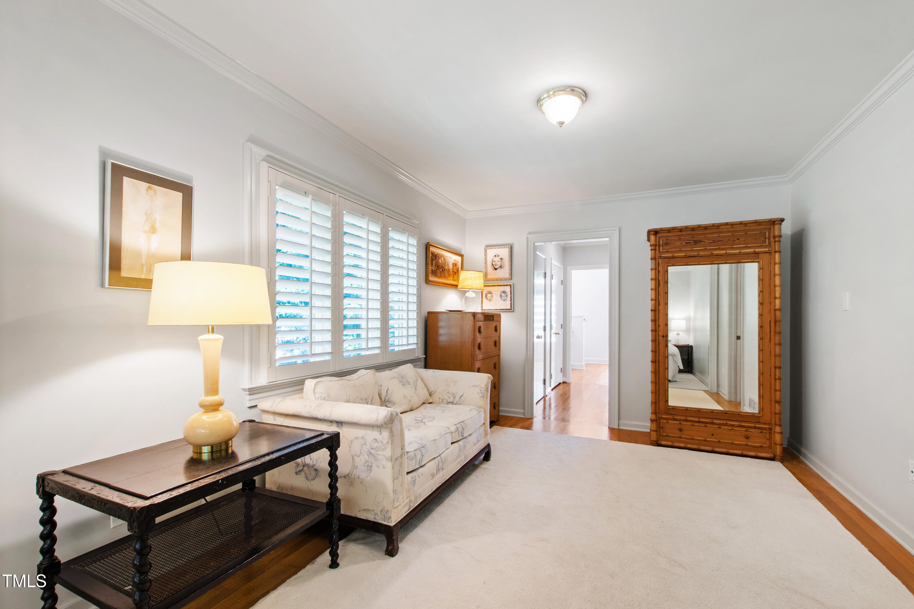 3028 Rothgeb Drive Raleigh, NC 27609 - Photo 19 of 35 a bedroom with a bed and a window