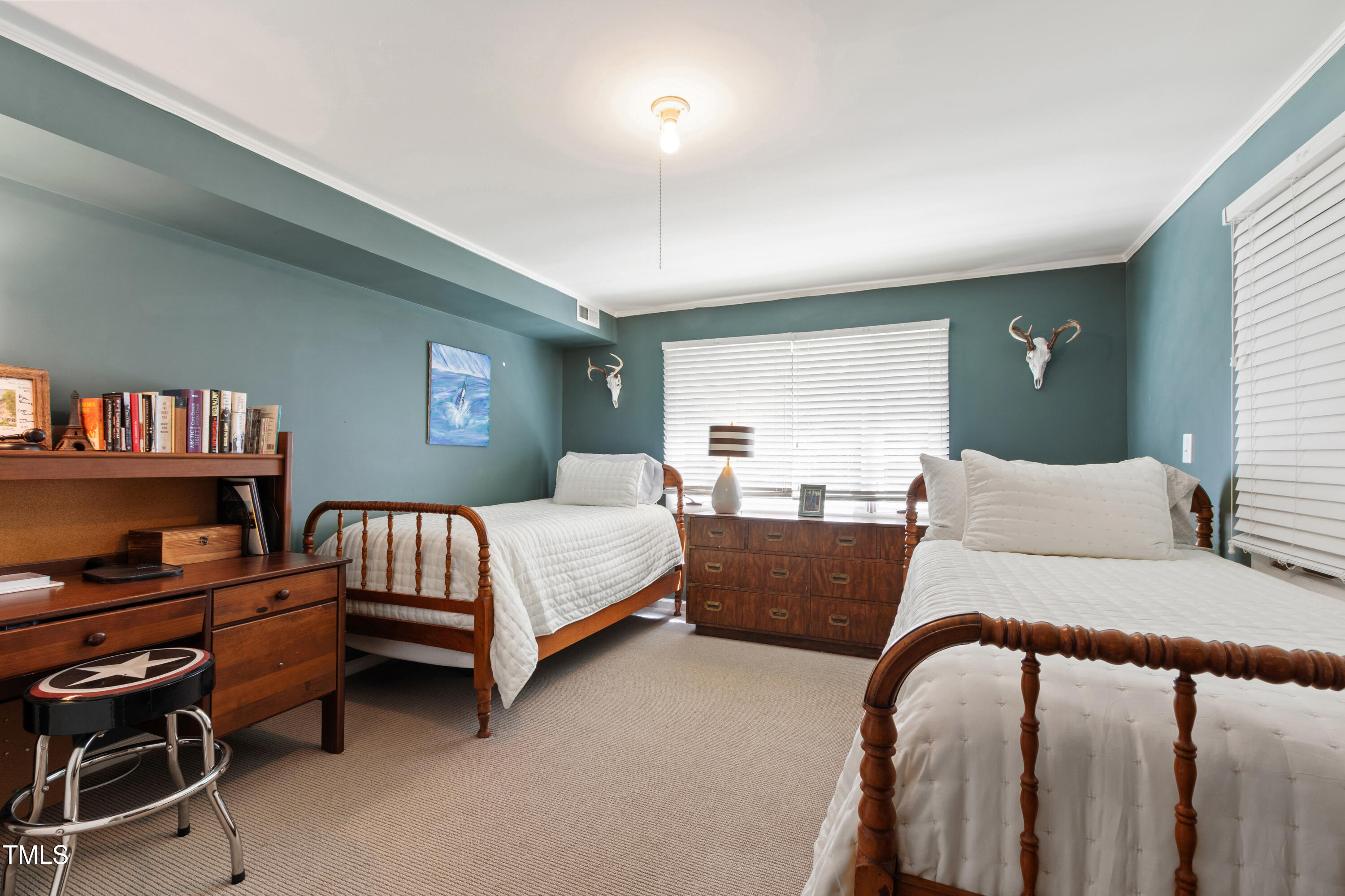 3028 Rothgeb Drive Raleigh, NC 27609 - Photo 30 of 35 a bedroom with furniture and a window