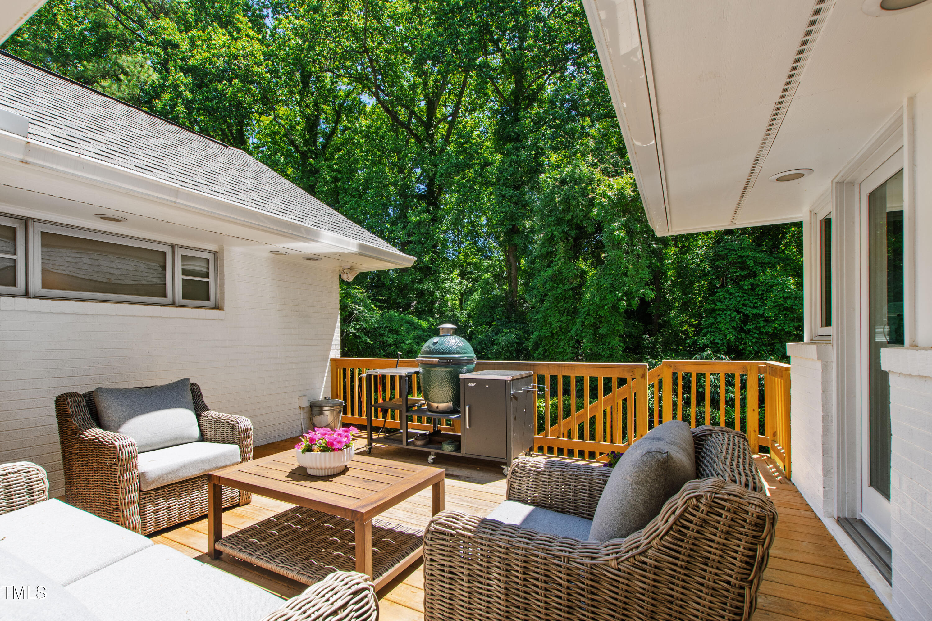 3028 Rothgeb Drive Raleigh, NC 27609 - Photo 33 of 35 a view of balcony with couch and outdoor seating
