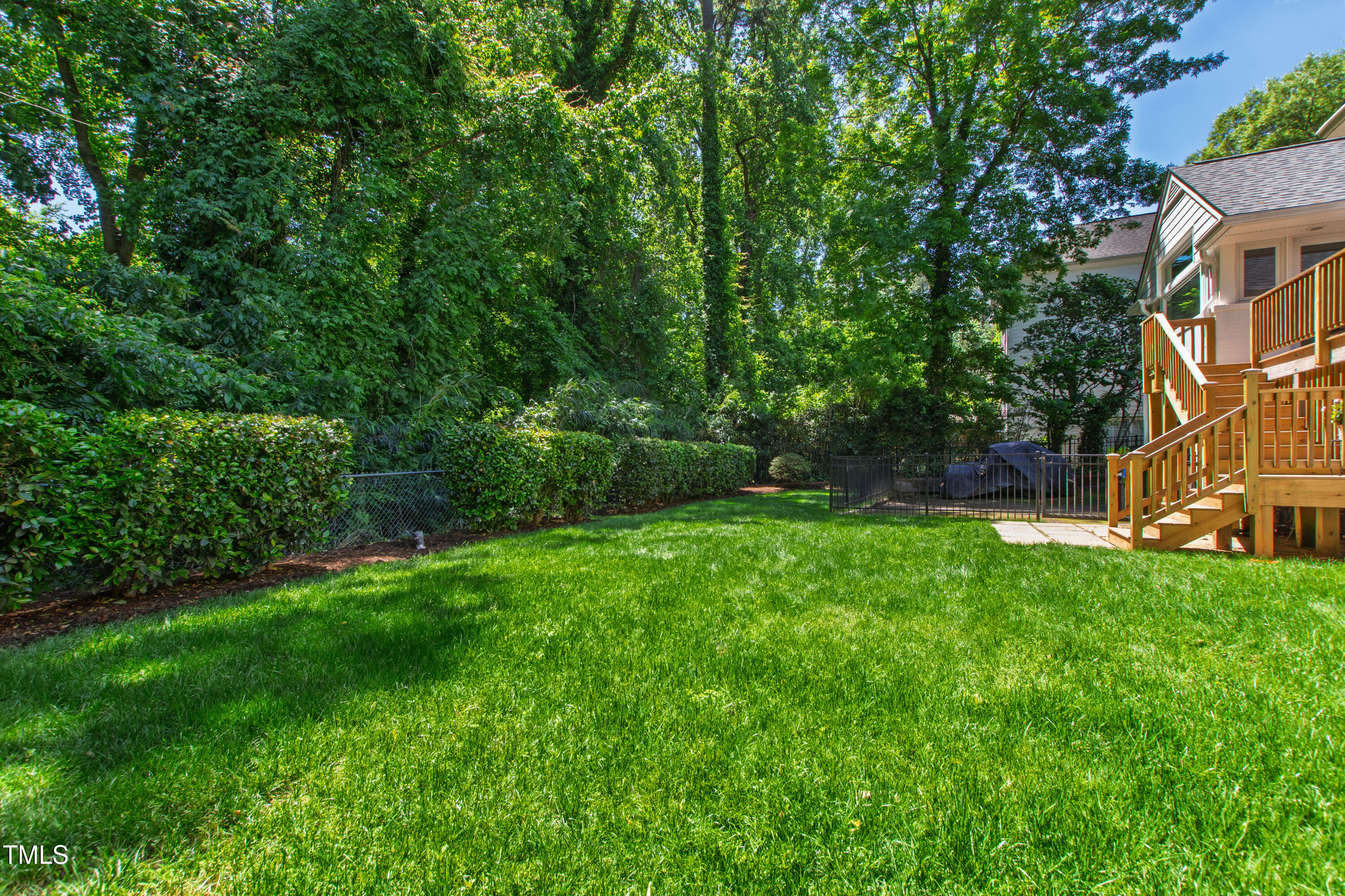 3028 Rothgeb Drive Raleigh, NC 27609 - Photo 34 of 35 a view of yard with swimming pool and green space