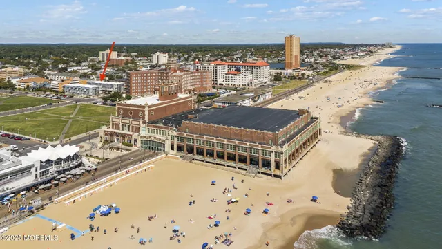 a view of a swimming pool with an ocean view