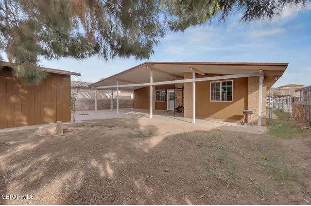 front view of a house with a dry yard