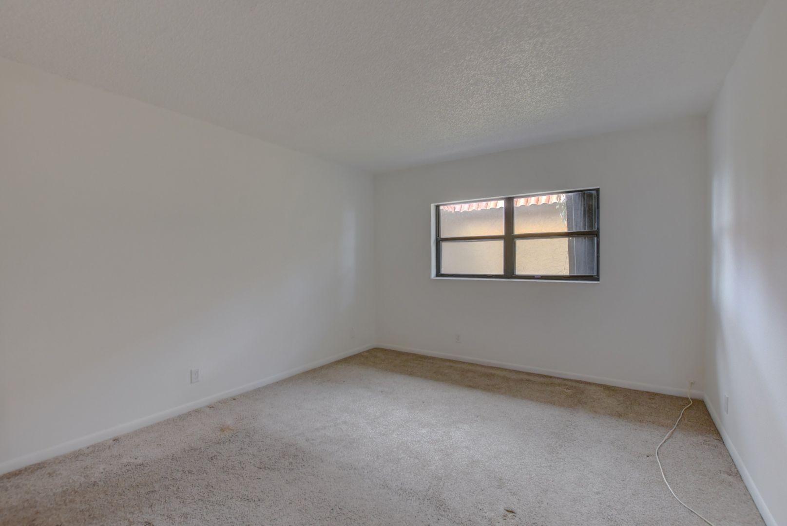 2001 Woolbright Road, Unit F204 Boynton Beach, FL 33426 - Photo 15 of 20 Master Bedroom
