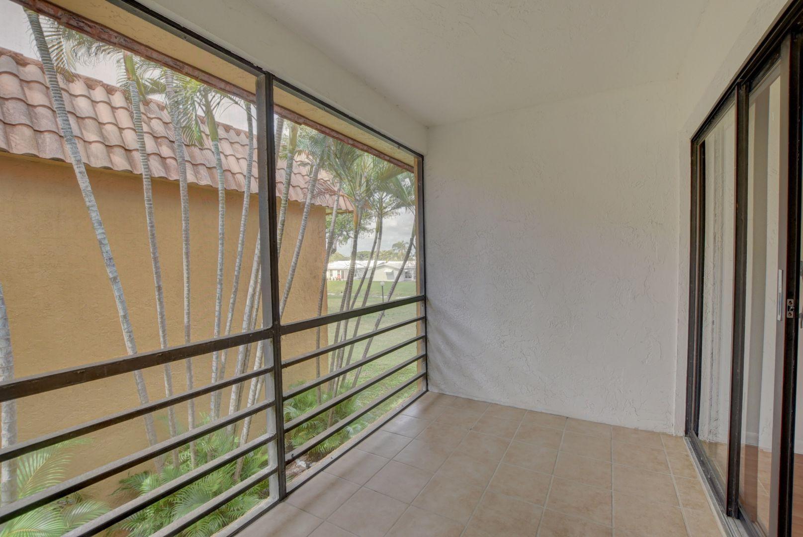 2001 Woolbright Road, Unit F204 Boynton Beach, FL 33426 - Photo 16 of 20 Screened Patio