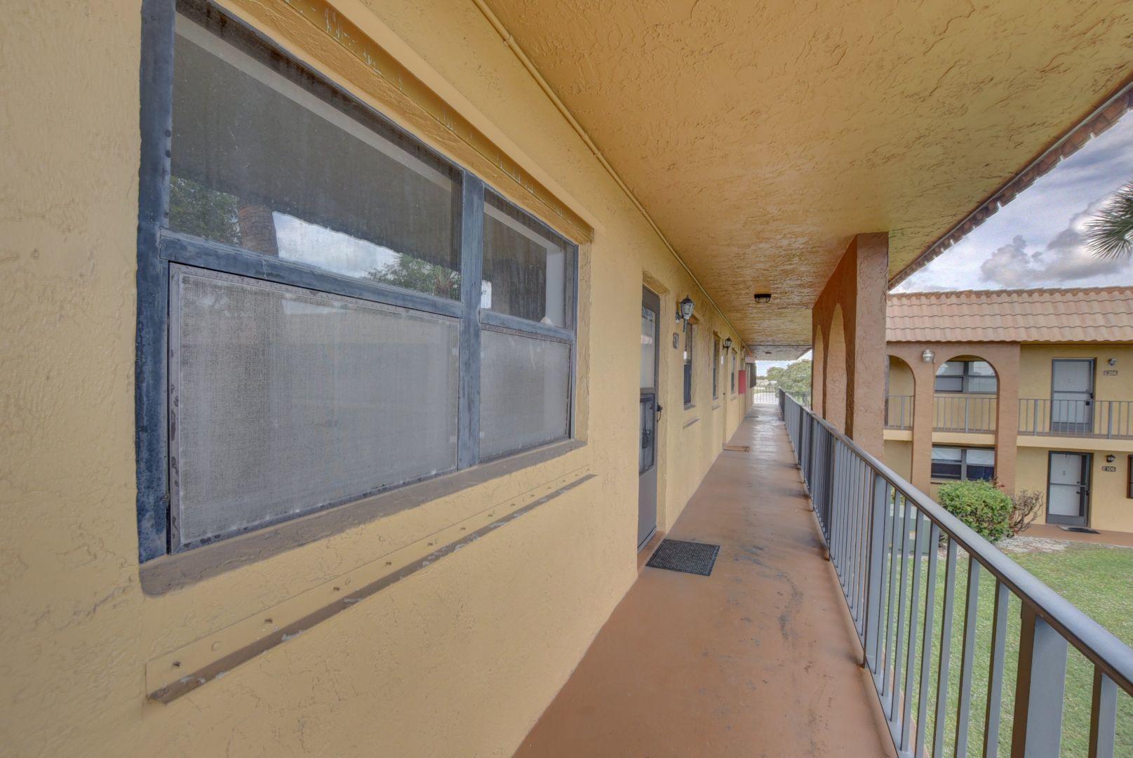 2001 Woolbright Road, Unit F204 Boynton Beach, FL 33426 - Photo 17 of 20 Upstairs Hallway
