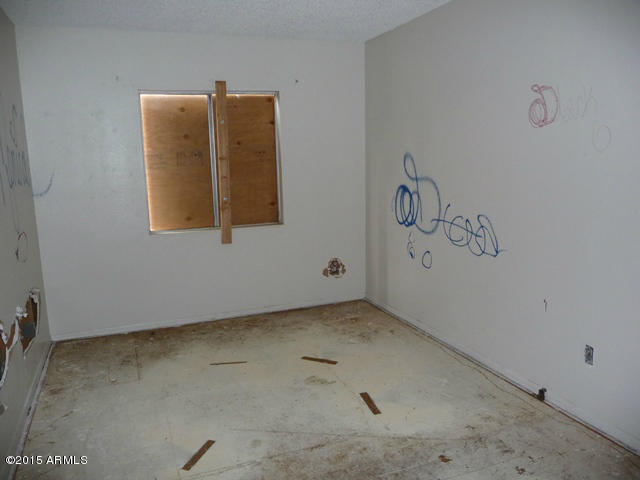 3605 West Bethany Home Road, Unit 8 Phoenix, AZ 85019 - Photo 8 of 10 view of an empty room