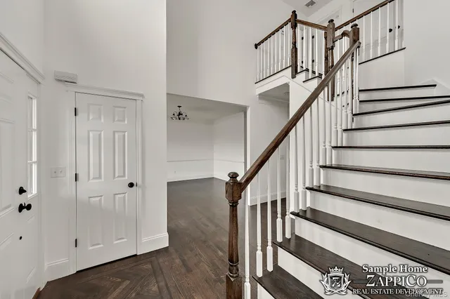a view of entryway with wooden floor