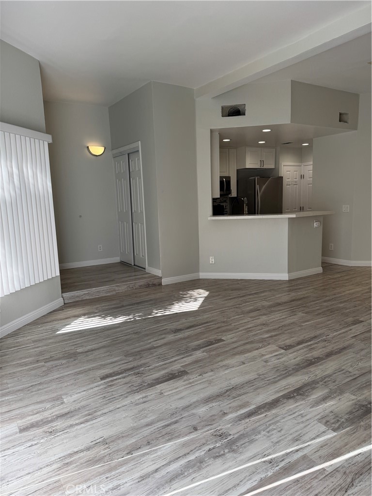 1730 Sinaloa Road Simi Valley, CA 93065 - Photo 15 of 38 a view of a room with wooden floor and entryway
