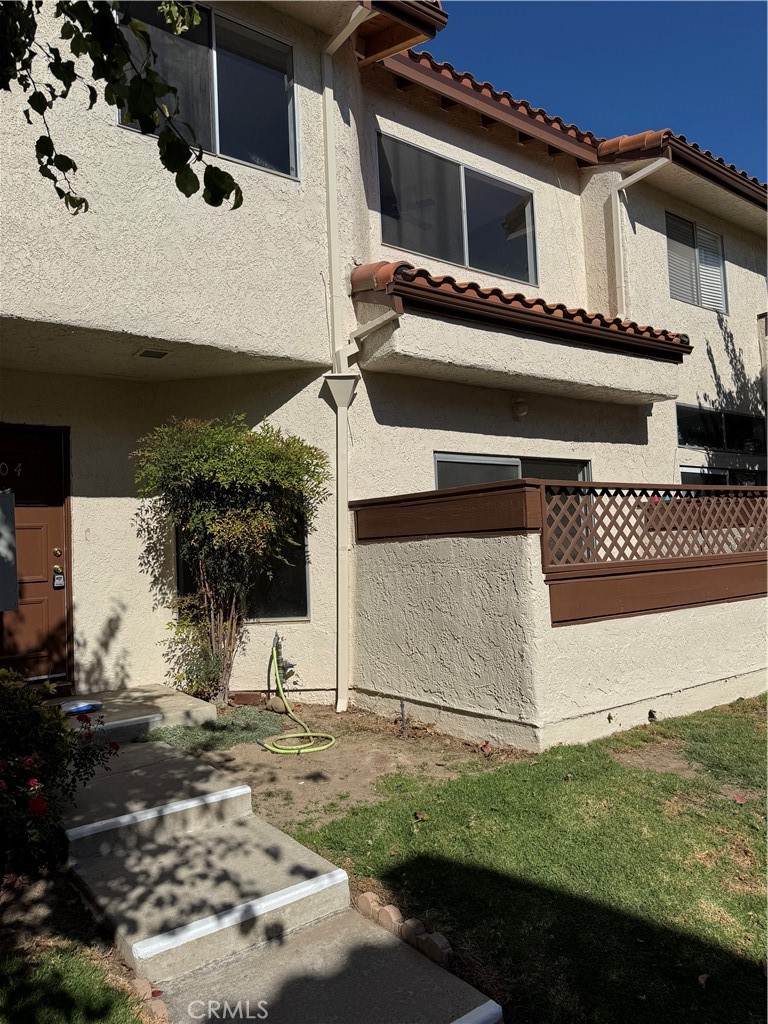 1730 Sinaloa Road Simi Valley, CA 93065 - Photo 2 of 38 a view of a house with a yard