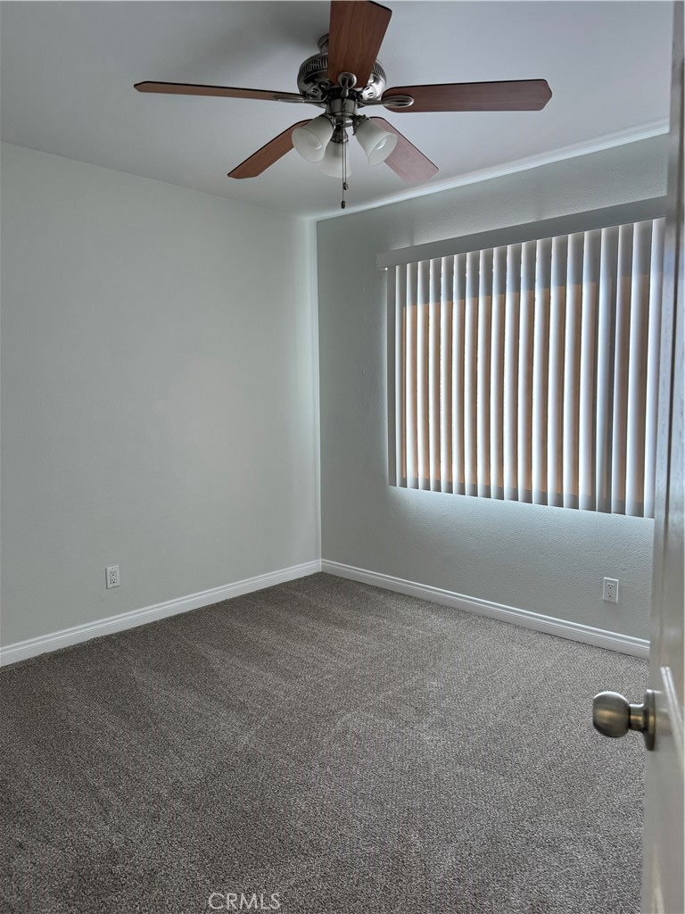 1730 Sinaloa Road Simi Valley, CA 93065 - Photo 22 of 38 a view of an empty room and a ceiling fan window