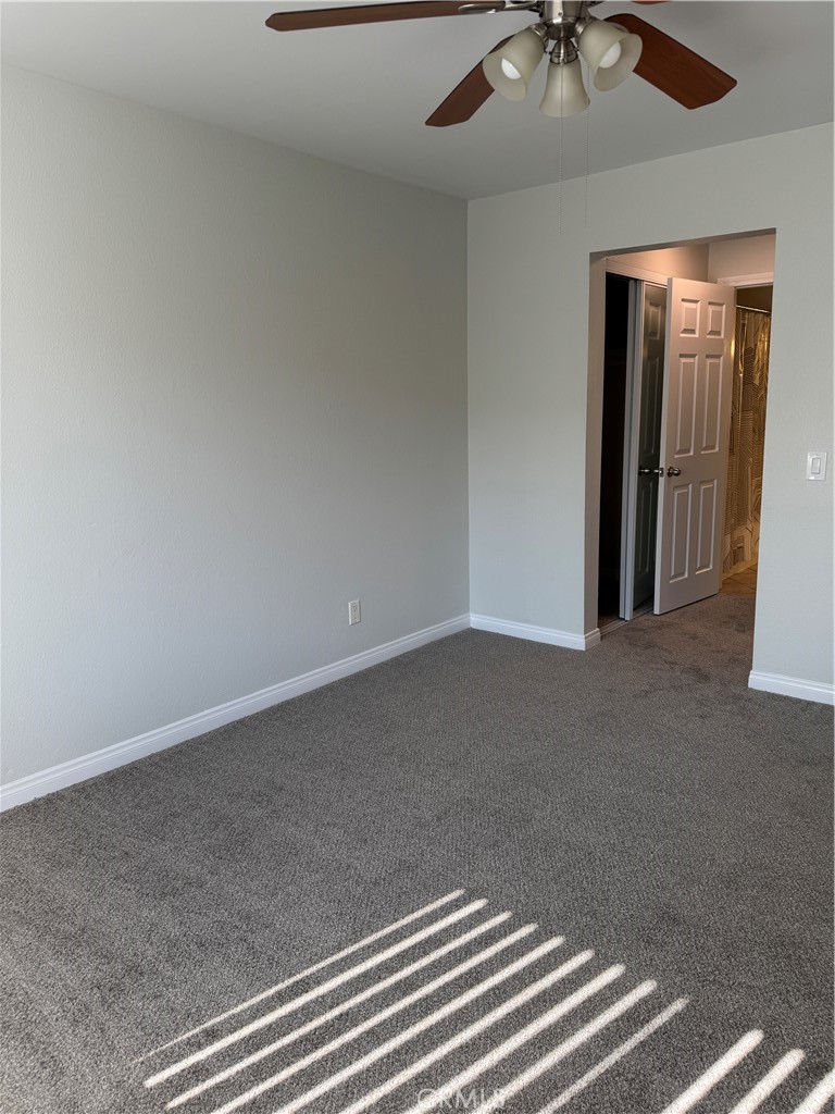 1730 Sinaloa Road Simi Valley, CA 93065 - Photo 26 of 38 a view of a livingroom with a ceiling fan