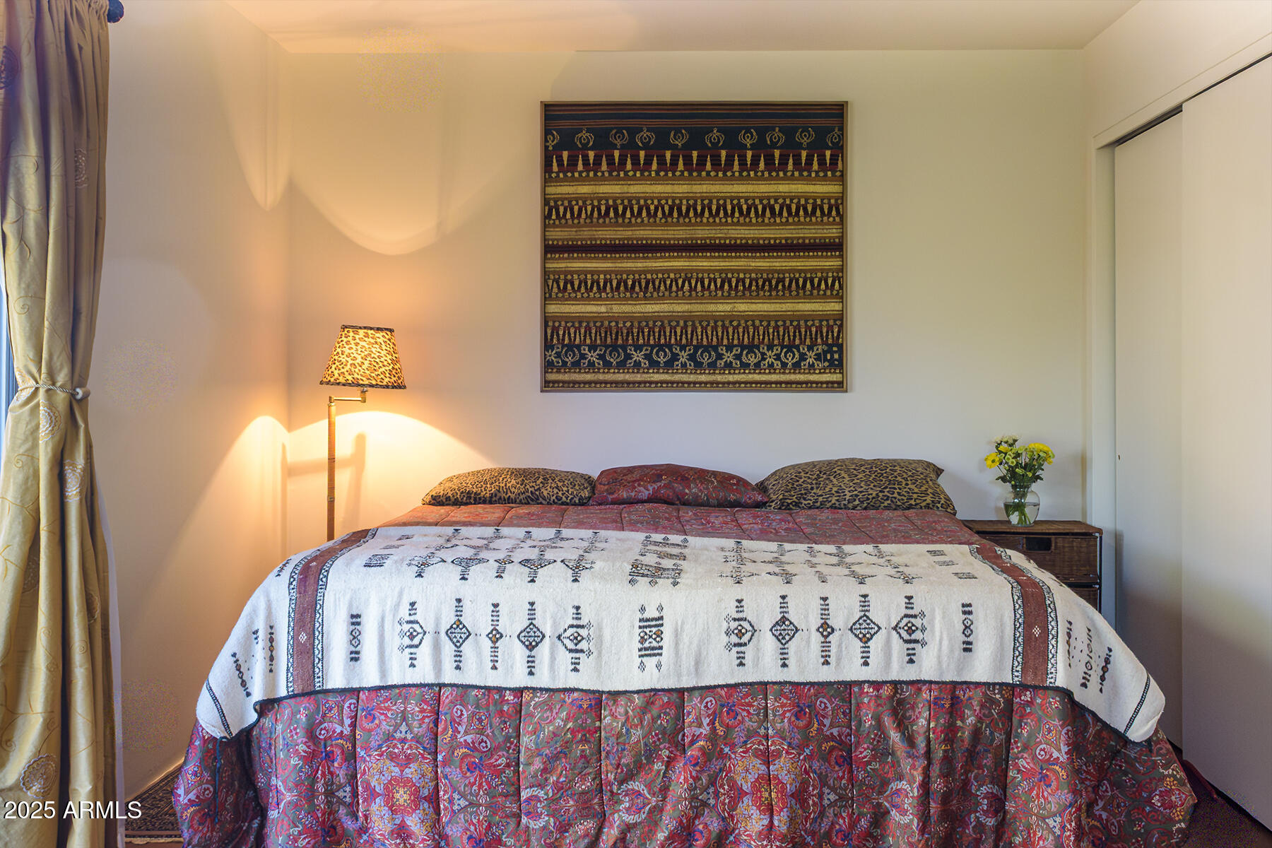 120 Indian Ruin Road Sedona, AZ 86351 - Photo 20 of 46 a bedroom with a bed and a dresser