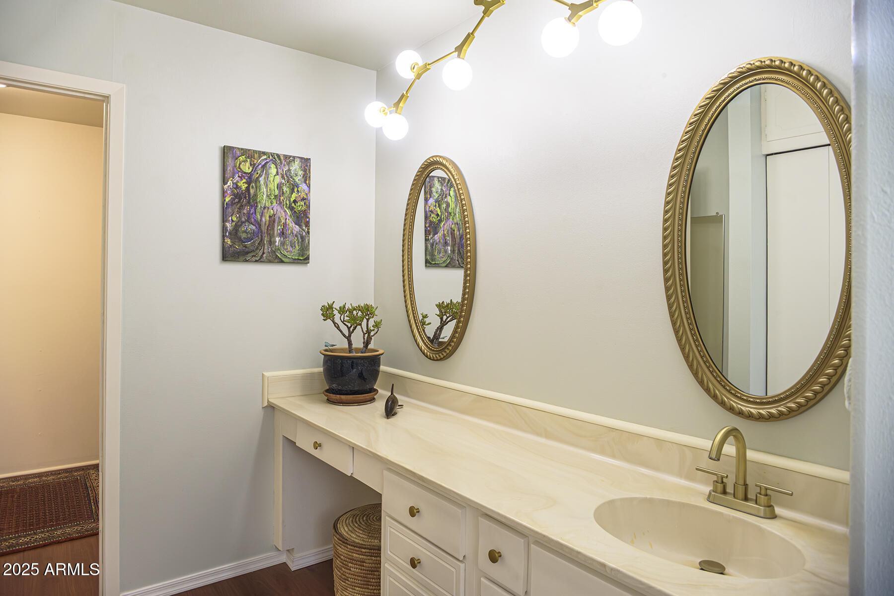 120 Indian Ruin Road Sedona, AZ 86351 - Photo 24 of 46 a bathroom with a granite countertop toilet a sink and a mirror