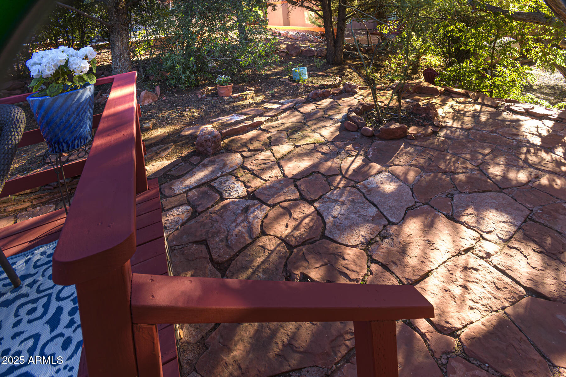 120 Indian Ruin Road Sedona, AZ 86351 - Photo 33 of 46 a backyard of a house with lots of green space