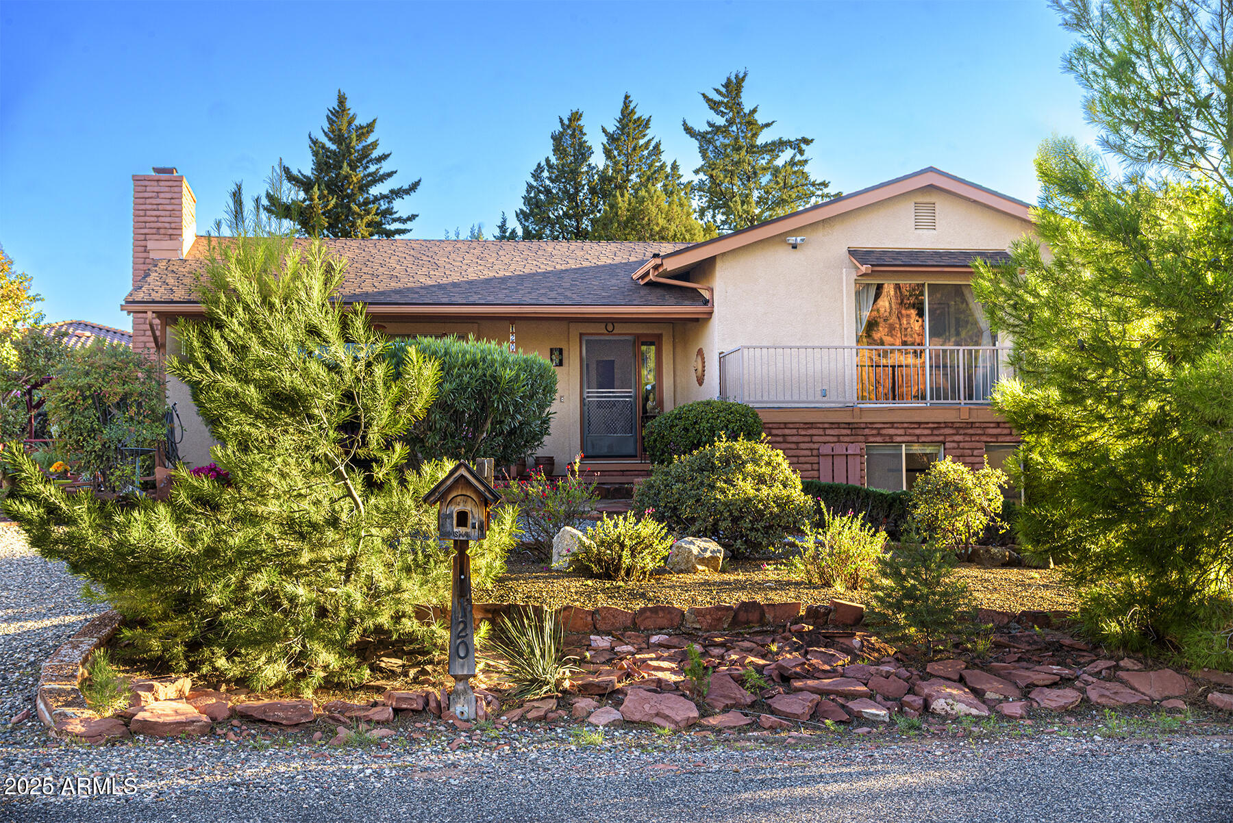 120 Indian Ruin Road Sedona, AZ 86351 - Photo 46 of 46 a front view of a house with a yard