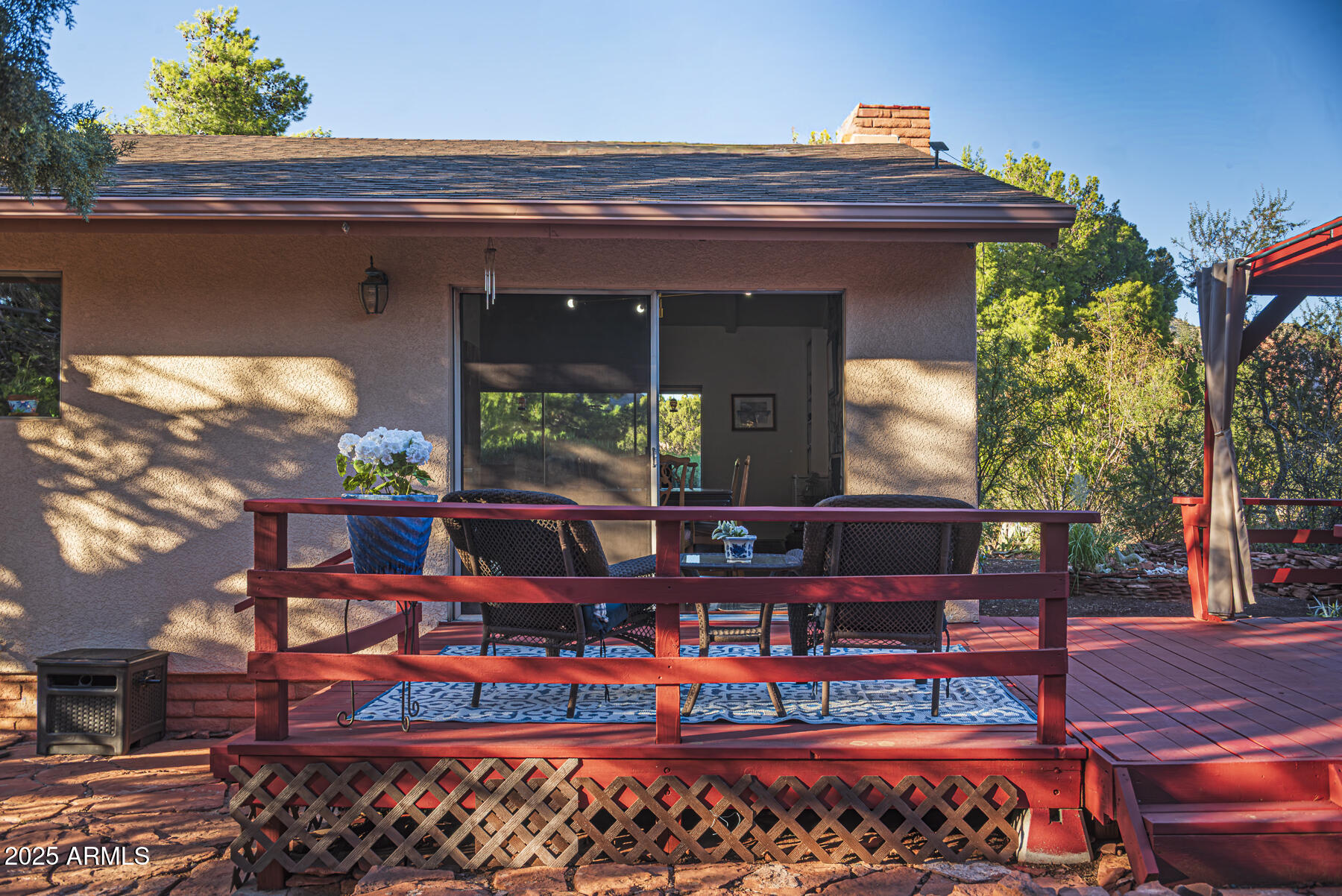 120 Indian Ruin Road Sedona, AZ 86351 - Photo 6 of 46 a view of a chairs and table in the patio